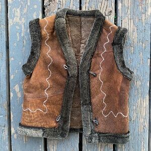Handmade sheepskin and mixed media vest